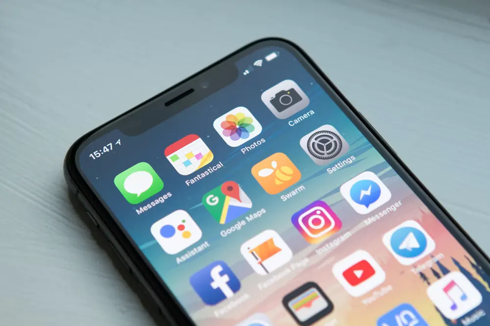A smartphone showing colourful app icons