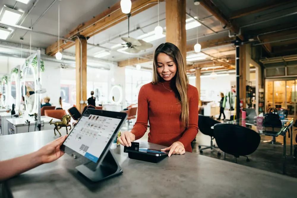 A card payment at a store checkout counter